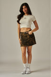 Falda Mini de Mezclilla Estampado Leopardo con Bolsillos Mujer | Casual Sexy