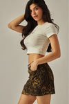 Falda Mini de Mezclilla Estampado Leopardo con Bolsillos Mujer | Casual Sexy