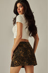 Falda Mini de Mezclilla Estampado Leopardo con Bolsillos Mujer | Casual Sexy
