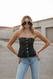 Top mezclilla abotonado strapless