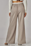 Pantalón Palazzo de Mujer a Rayas con Bolsillos y Cintura Elástica con Moño | Casual Chic