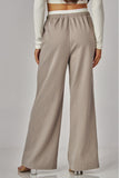 Pantalón Palazzo de Mujer a Rayas con Bolsillos y Cintura Elástica con Moño | Casual Chic