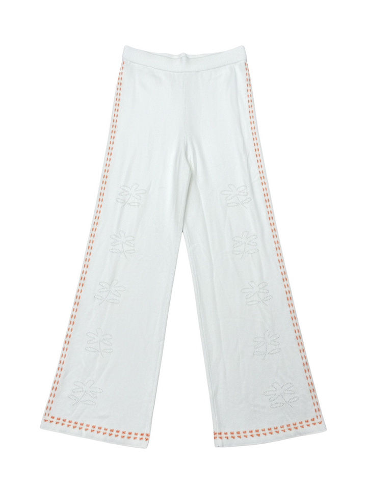 Pantalón blanco con costuras naranjas