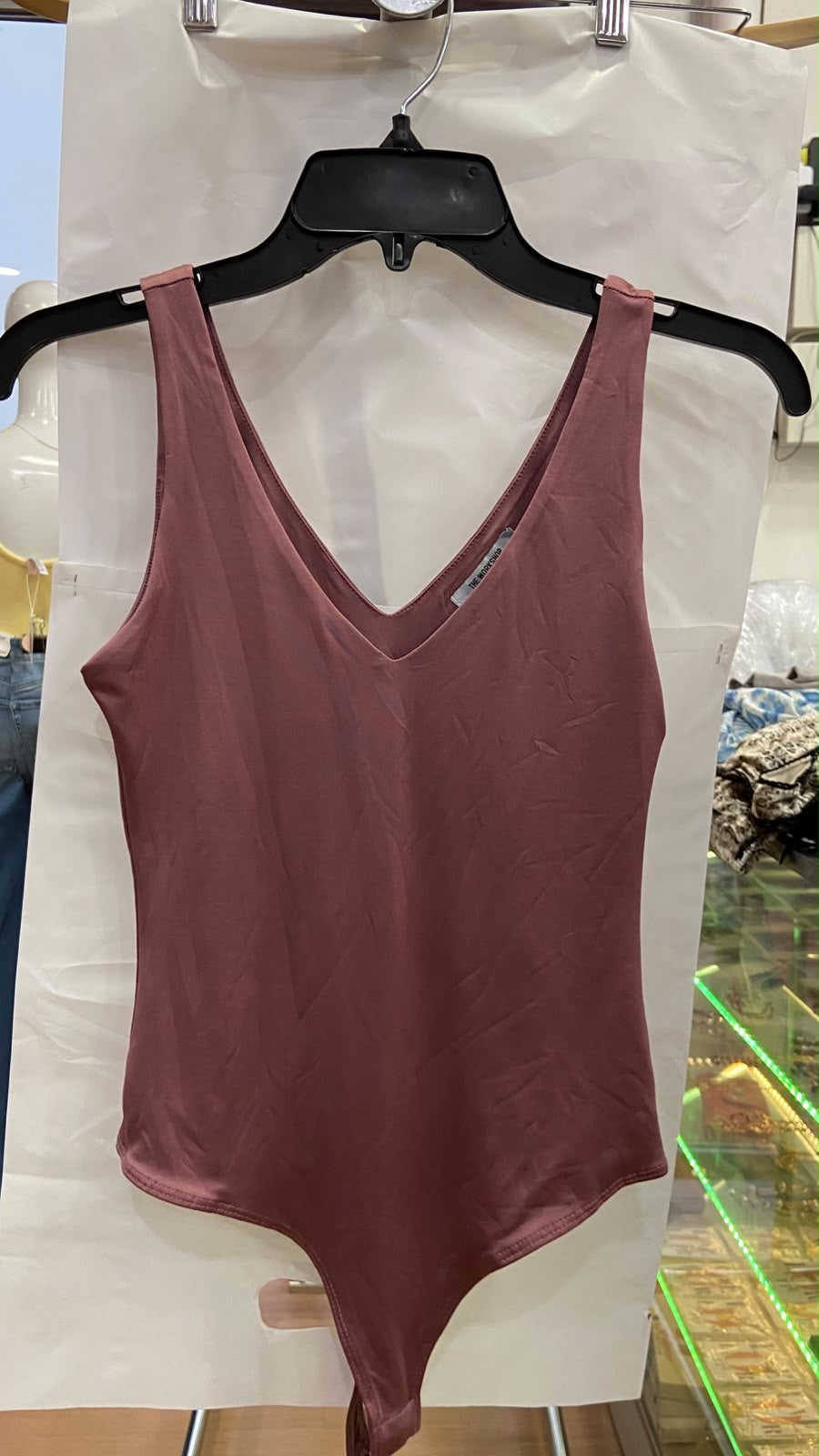 Body V-Neck Sin Mangas en Rosa Polvo - Elegancia Boutique