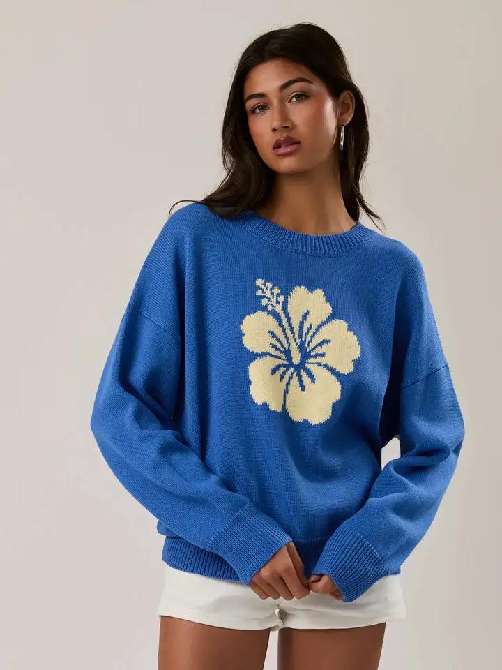 Yanet Collective Suéter azul con flor amarilla -
