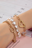 3 pulseras con palanca de corazón y perlas de corazón