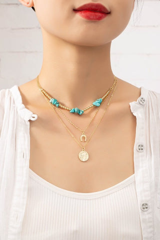 Gargantilla con herradura turquesa y moneda collar joyería