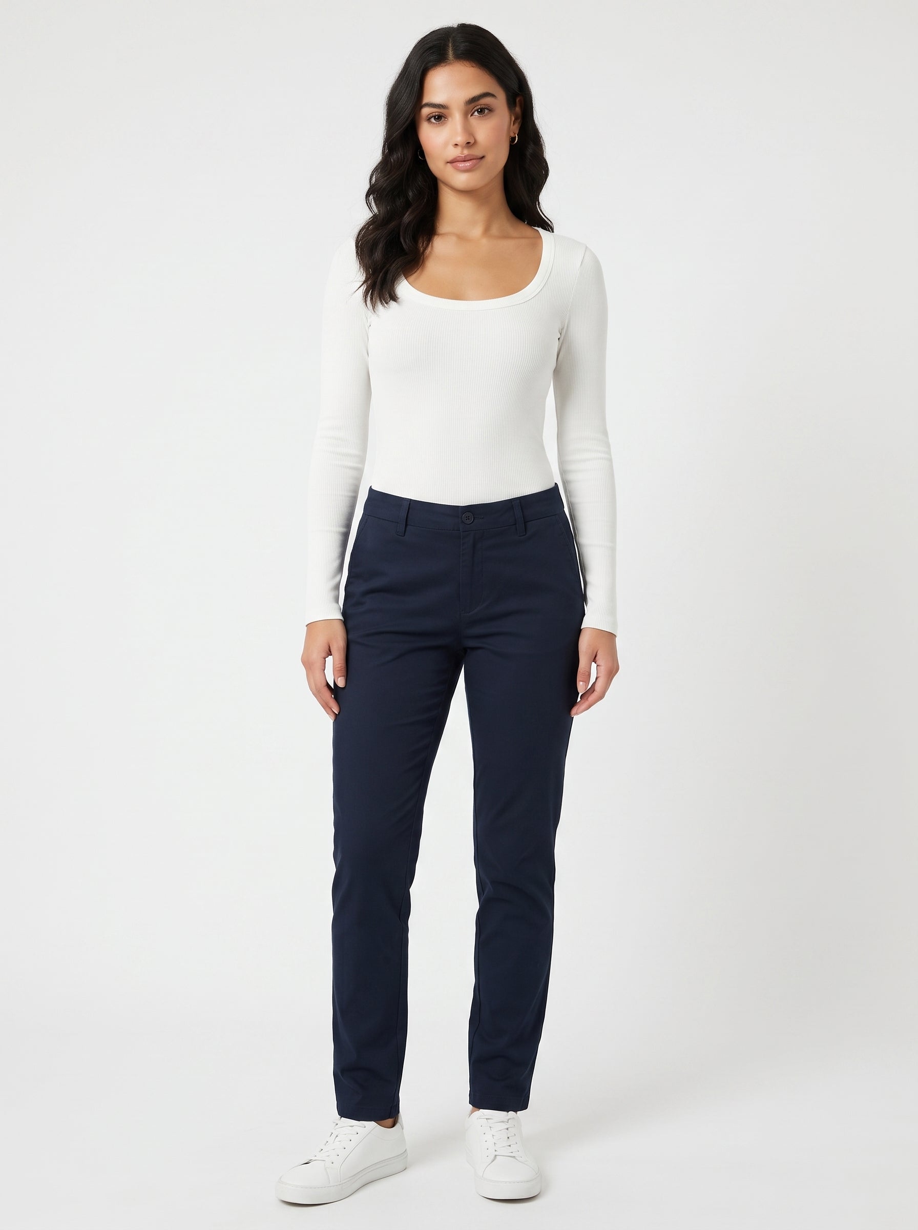 Studio photo of Blusa Standing facing the camera, natural confident posture, arms relaxed at sides, front view, full body visible. CAMERA SHOT: A FULL BODY shot capturing the person from head to toe. [Full body]