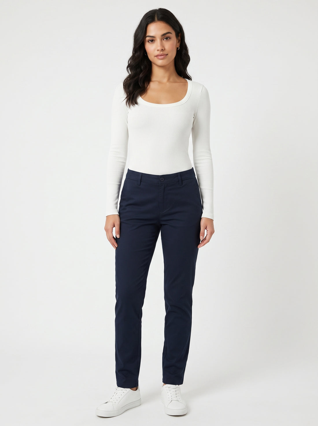 Studio photo of Blusa Standing facing the camera, natural confident posture, arms relaxed at sides, front view, full body visible. CAMERA SHOT: A FULL BODY shot capturing the person from head to toe. [Full body]
