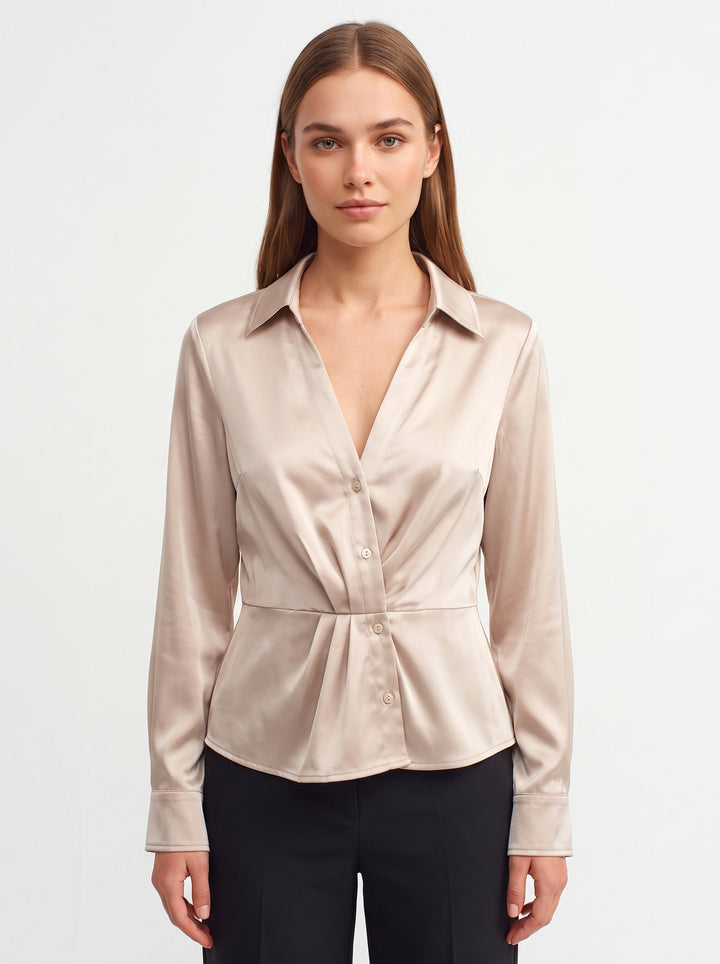 Studio photo of Blusa de Satín para Dama con Escote Cruzado y Botones Standing facing the camera, natural confident posture, arms relaxed at sides, front view, full body visible. CAMERA SHOT: A FULL BODY shot capturing the person from head to toe. [Upper body focus]