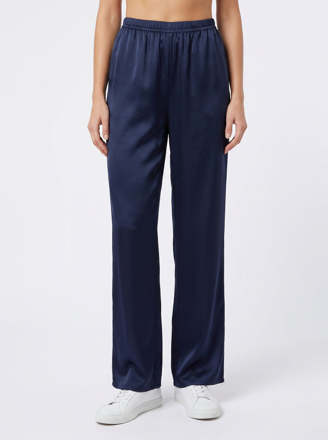 Studio photo of Pantalón azul marino satin Lower body shot from waist down, facing camera, showing pants/skirt front, legs straight. CAMERA SHOT: A FULL BODY shot capturing the person from head to toe. [Full body]