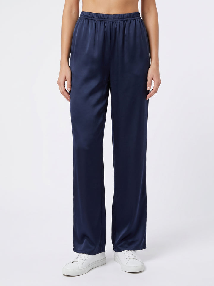 Studio photo of Pantalón azul marino satin Lower body shot from waist down, facing camera, showing pants/skirt front, legs straight. CAMERA SHOT: A FULL BODY shot capturing the person from head to toe. [Full body]