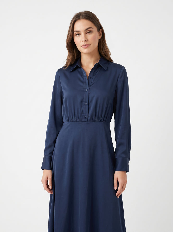 Studio photo of Vestido Seda Azul Manga Larga Upper body shot from chest up, facing camera, natural expression, shoulders relaxed. CAMERA SHOT: A FULL BODY shot capturing the person from head to toe. [Upper body focus]