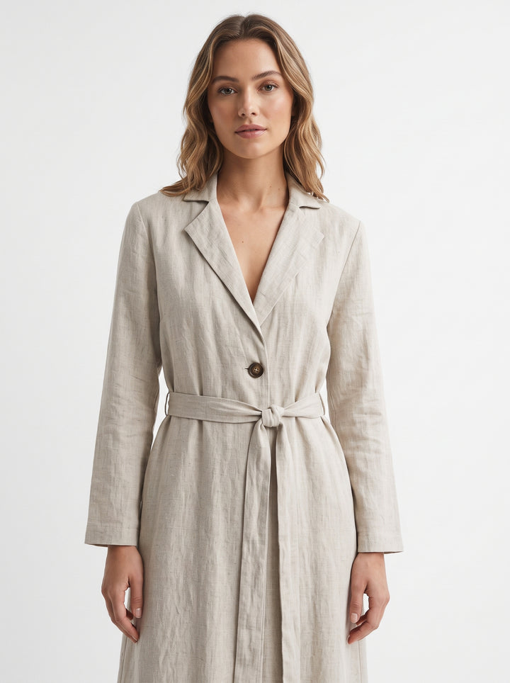 Studio photo of Vestido Beige Manga Larga Para Mujer Elegante Y Versátil Ideal Para Ocasiones Formales Y Casuales Upper body shot from chest up, facing camera, natural expression, shoulders relaxed. CAMERA SHOT: A FULL BODY shot capturing the person from head to toe. [Upper body focus]