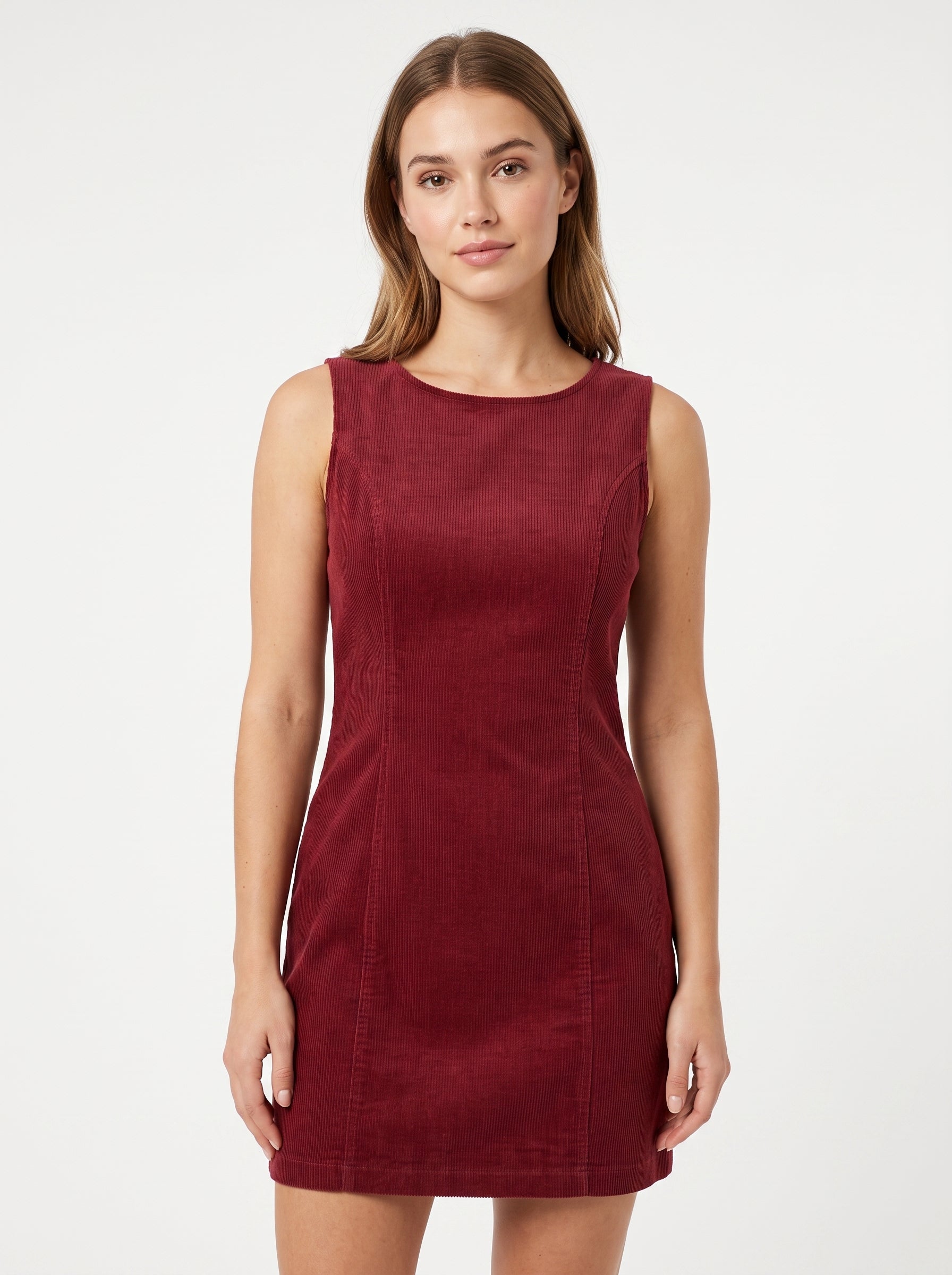Studio photo of Vestido rojo pana Upper body shot from chest up, facing camera, natural expression, shoulders relaxed. CAMERA SHOT: A FULL BODY shot capturing the person from head to toe. [Upper body focus]