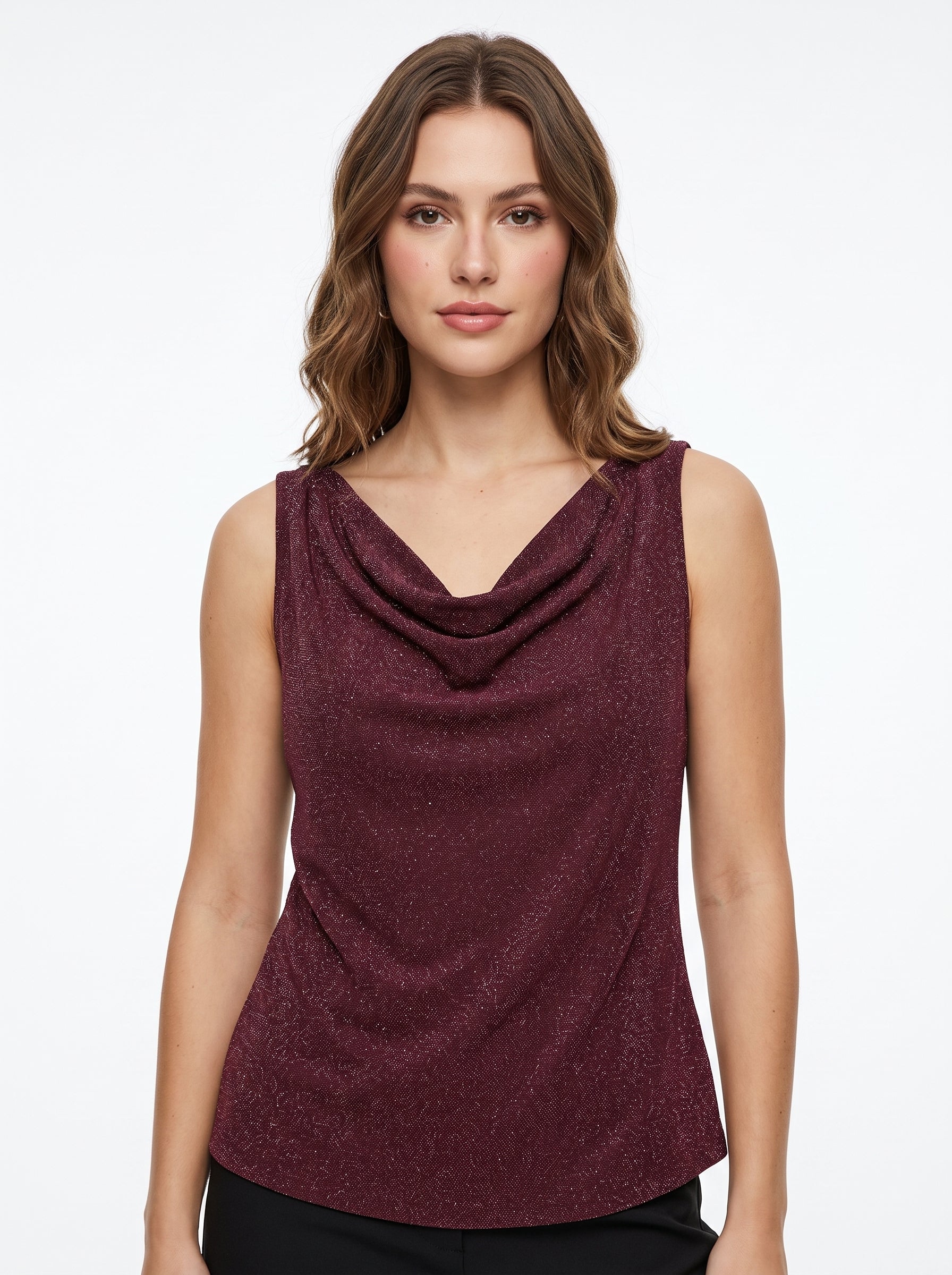 Studio photo of Blusa brillos Standing facing the camera, natural confident posture, arms relaxed at sides, front view, full body visible. CAMERA SHOT: A FULL BODY shot capturing the person from head to toe. [Upper body focus]