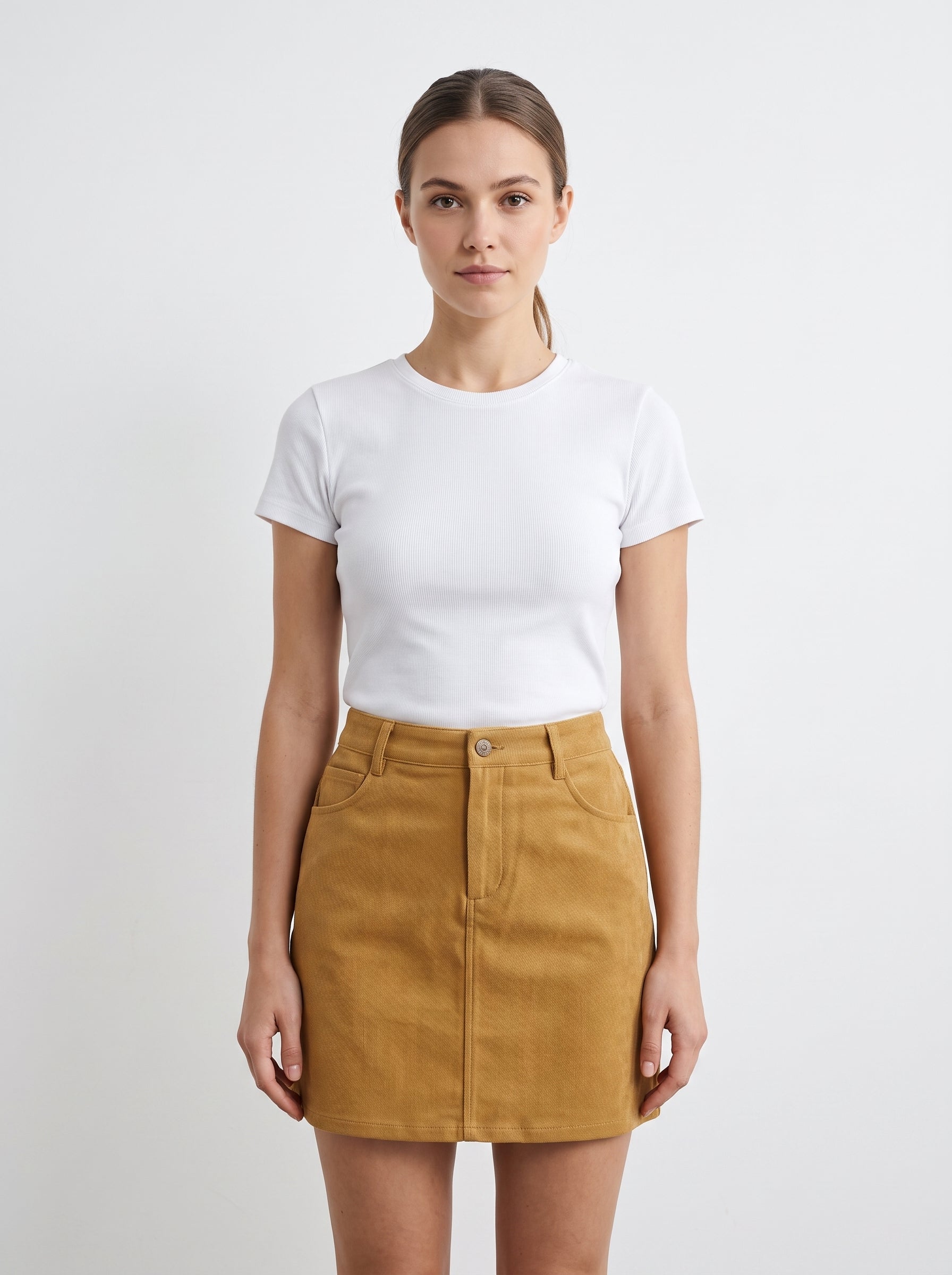 Studio photo of Falda Standing facing the camera, natural confident posture, arms relaxed at sides, front view, full body visible. CAMERA SHOT: A FULL BODY shot capturing the person from head to toe. [Upper body focus]