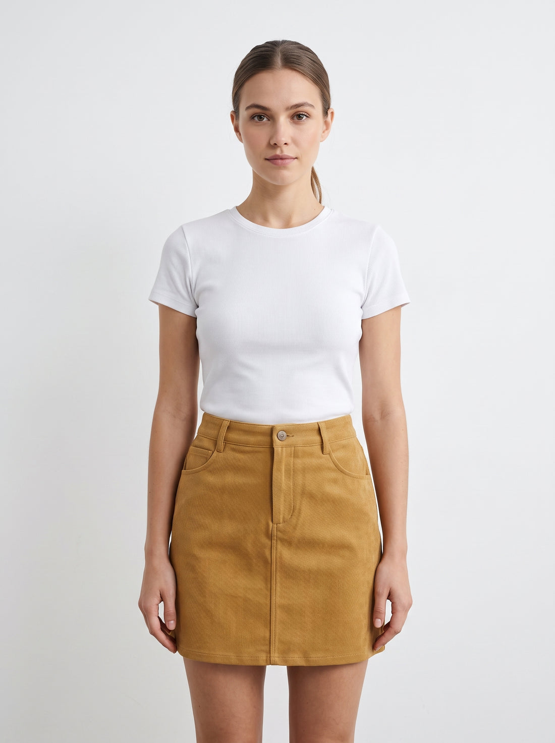 Studio photo of Falda Standing facing the camera, natural confident posture, arms relaxed at sides, front view, full body visible. CAMERA SHOT: A FULL BODY shot capturing the person from head to toe. [Upper body focus]