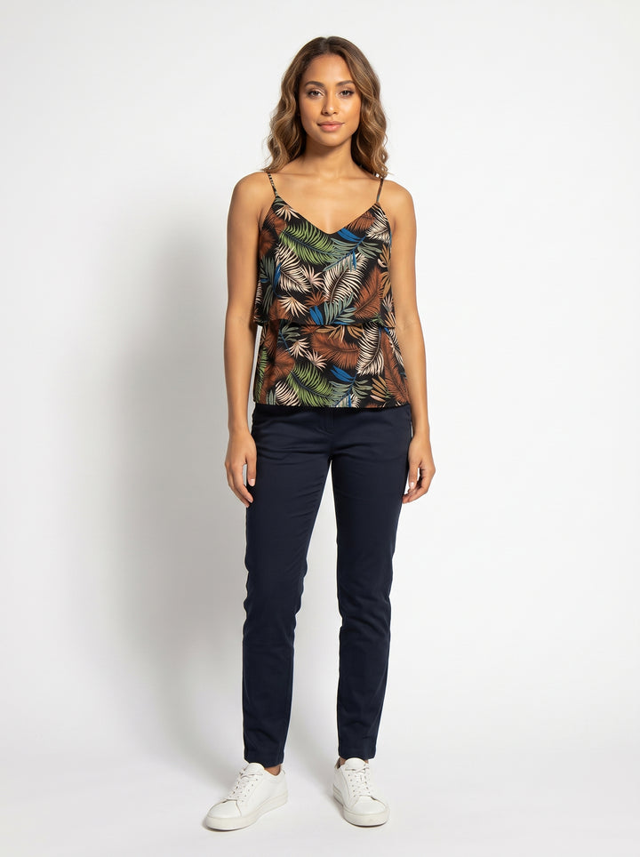 Studio photo of Romper Standing facing the camera, natural confident posture, arms relaxed at sides, front view, full body visible. CAMERA SHOT: A FULL BODY shot capturing the person from head to toe. [Full body]