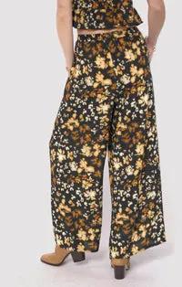 Pantalón negro flores by Yanet Collective