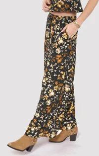 Pantalón negro flores by Yanet Collective