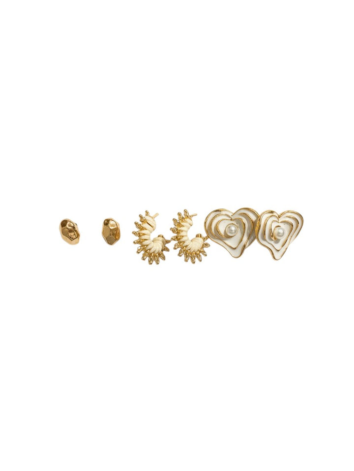 Yanet Collective trio of beige and gold earrings featuring small studs, textured hoops, and heart-shaped pearl designs.