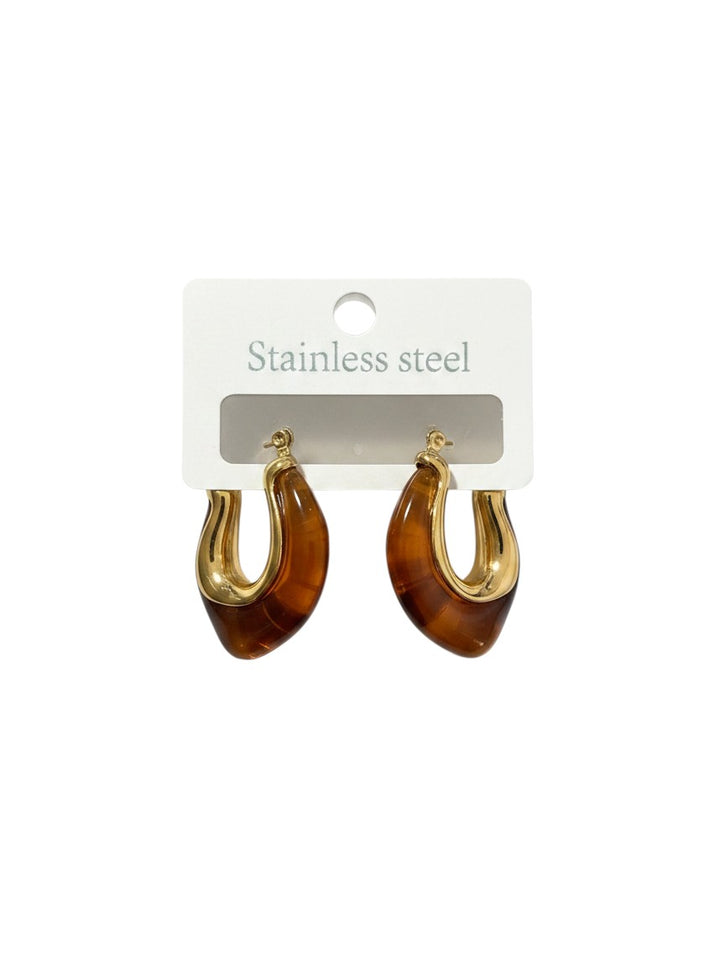 Yanet Collective brown resin and gold stainless steel hoop earrings on display card