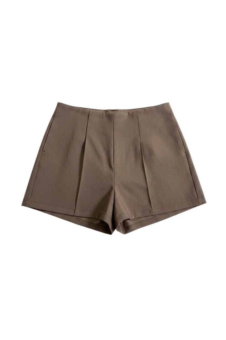 Yanet Collective Shorts Cafe in a neutral brown shade featuring a high-waisted tailored fit with front pleats.