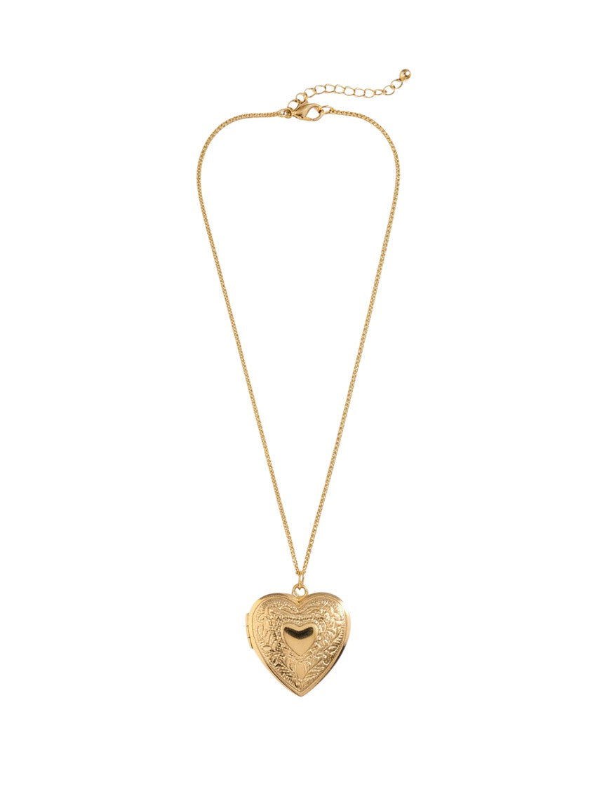 Yanet Collective gold heart locket necklace with intricate floral engraving on a delicate chain