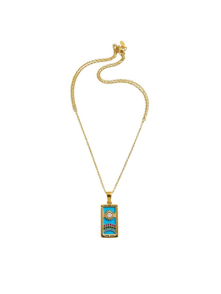 Yanet Collective Collar THE SUN gold necklace featuring a rectangular tarot card pendant with a sun and rainbow design.